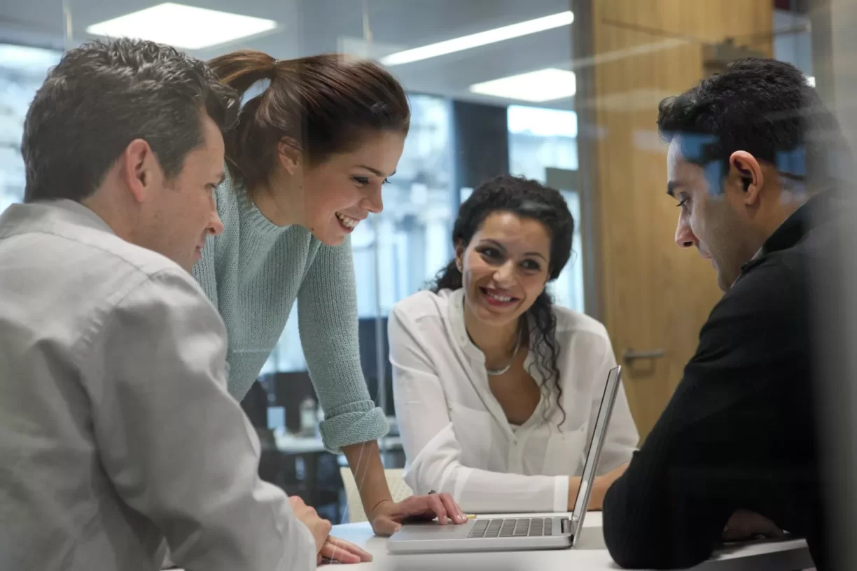 Employees Having A Meeting In The Office