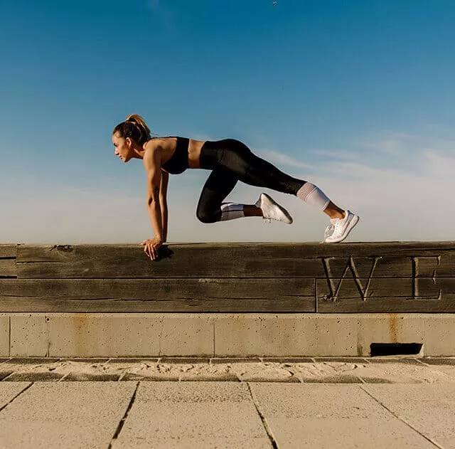 Fit Woman Doing A Stunt
