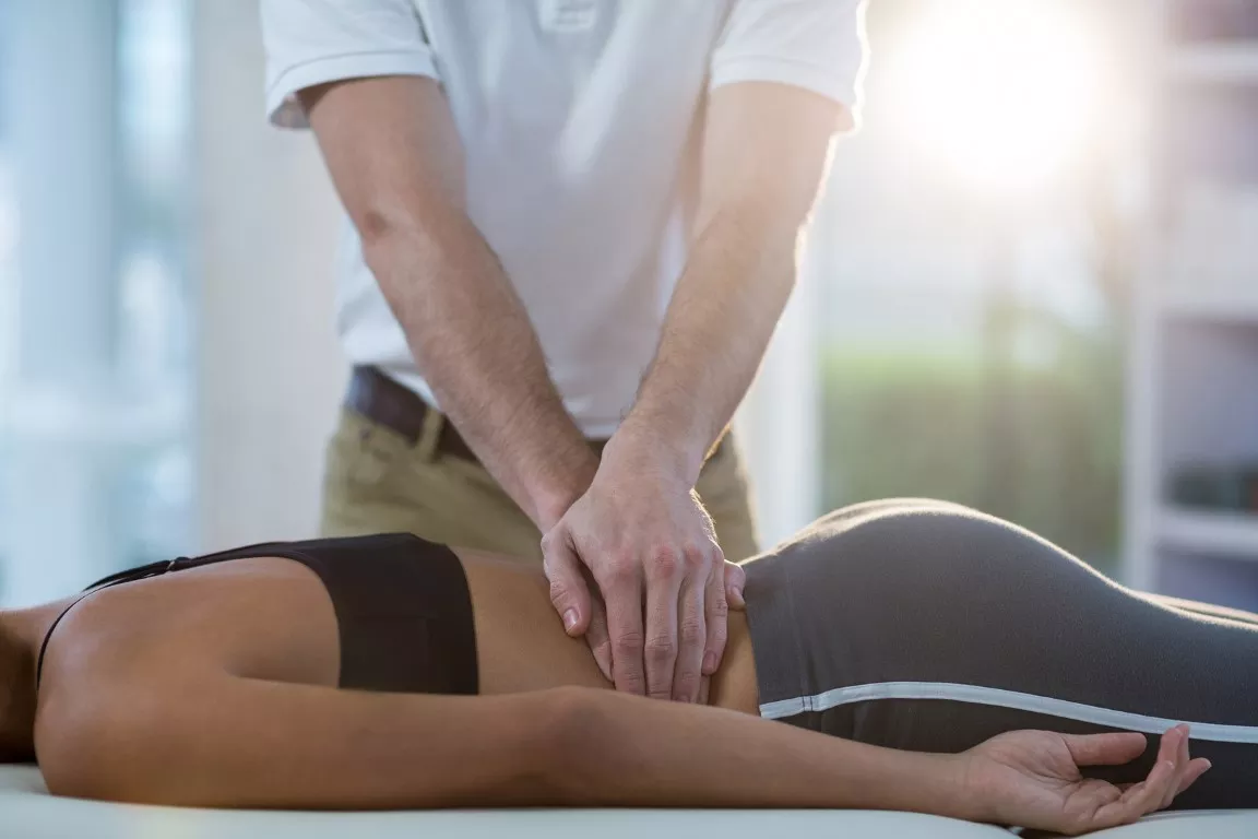 Physiotherapist Giving A Massage to A Woman