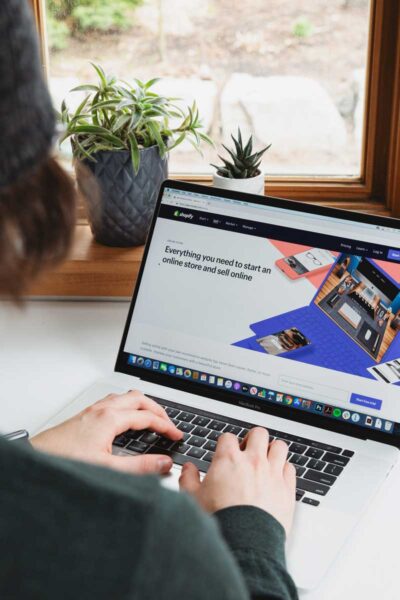 A Person Using A Laptop
