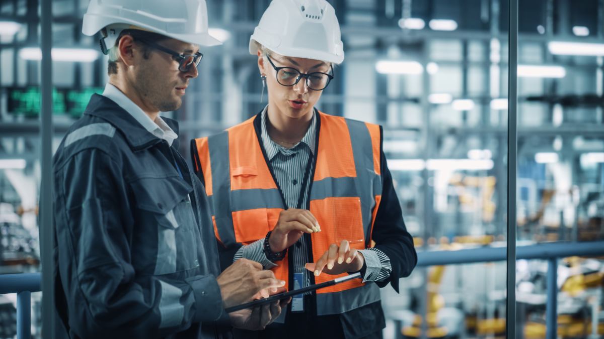 Engineers on High Visibility Workwear and Helmet