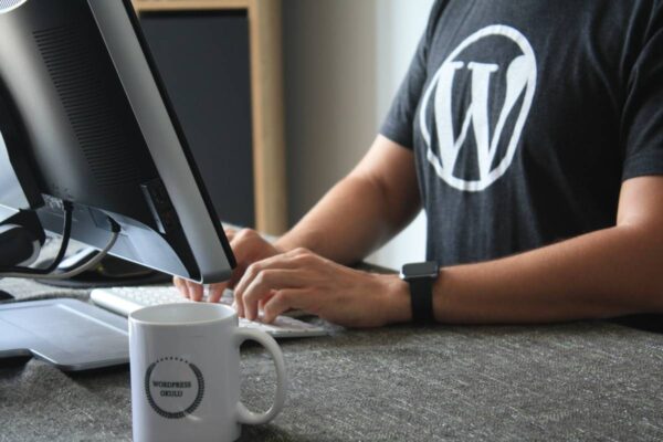 Typing Man with WordPress Logo Shirt