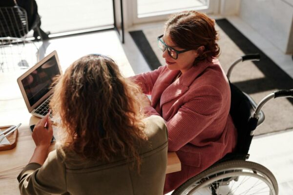 Two Ladies in A Meeting