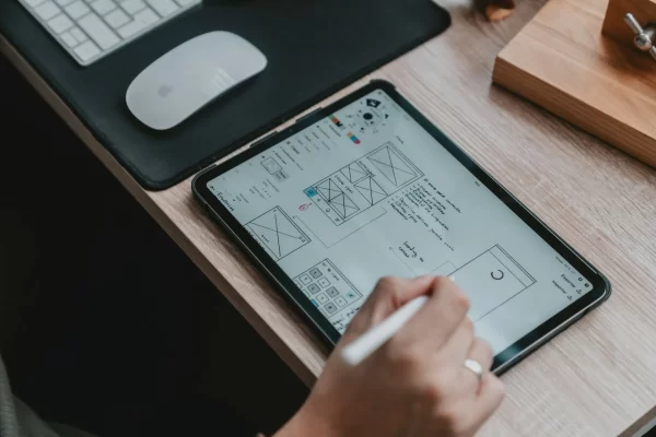 Person Doing A Mockup Design on A Tablet