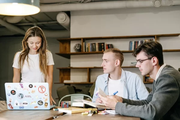 Three People Having A Meeting